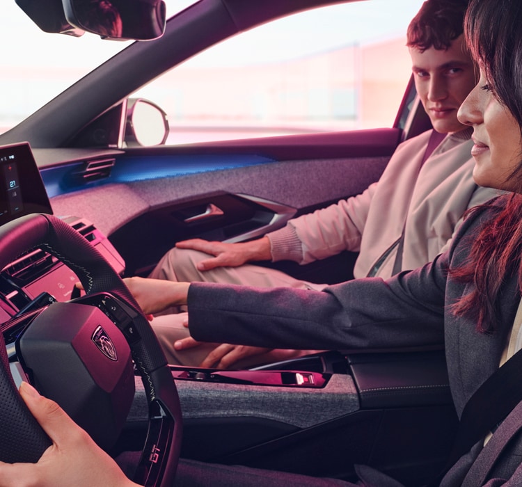 Couple inside the new PEUGEOT 3008 hybrid